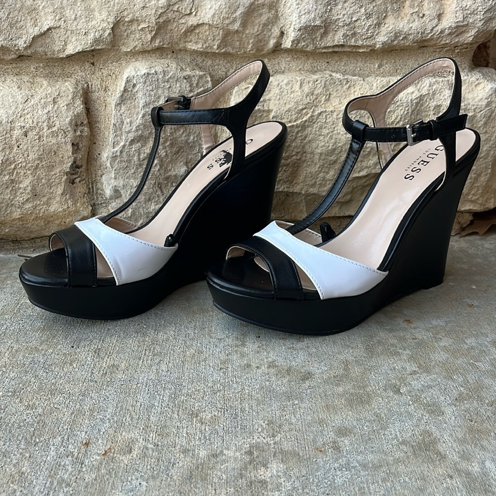 Guess wedges.. black and white. Size 7 1/2.